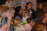 julia and mommy watching a puppet show
