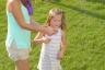 Abby trying out her champagne popper from the pinata
