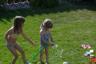 The girls had fun playing in the sprinkler and with the hose while I set up tables