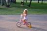 Megan is a pro at riding her bike already (at two years old!)