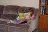 Callie is reading a story to Julia