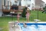 the kids swam with Erin and Connor at their neighbor's pool