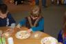 Julia frosting her cookie