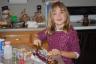 Callie frosting the cookies