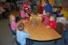 Julia's friend Brooke (the blonde in pink on the chair) at snack station