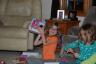 Opening gifts from Grandma and Grandpa Ivey - Julia got Licorice the cat!