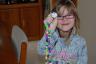 Her necklace had 100 beads