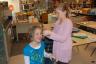 Doing hair at Girl Scouts