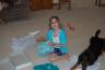 Opening an early birthday gift from Grandma and Grandpa Robinson