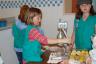 squeezing lemons for lemonade