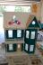 Now we are gluing the roof and then we will shingle.  I put one door and window in just for fun