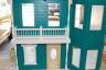 We finished the porch and balcony -  each tiny dowel had to be painted and glued!