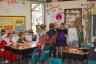 The principal is a clown making balloon animals