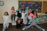 Julia's Brownie troop playing dress up for the Let's Pretend patch