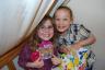 Between counties Julia would open a gift & have that passenger join her in the front of the plane