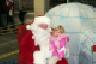 Julia ran to sit on Santa's lap at HyVee!
