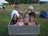 Uncle Tom is giving the kids a ride back to our chairs!
