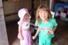 Playing in the little house - Julia decided to wear her new outfit we bought